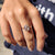 This cushion cut solitaire ring offers a classic and elegant look.