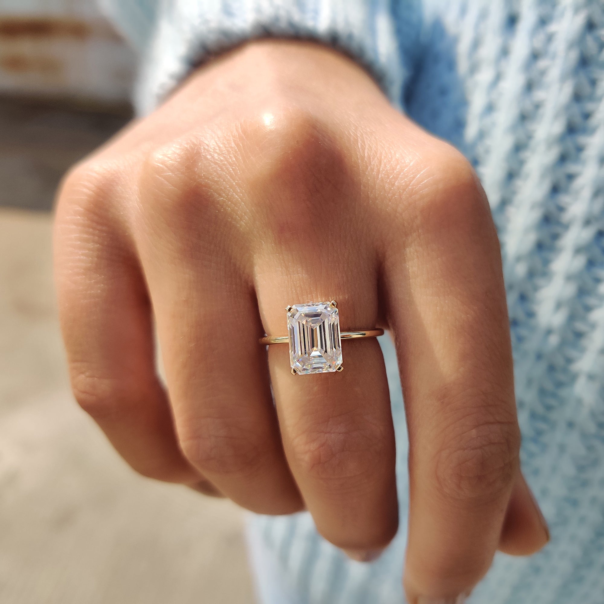 Antique emerald cut ring with yellow gold band.
