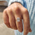Antique emerald cut ring with yellow gold band.
