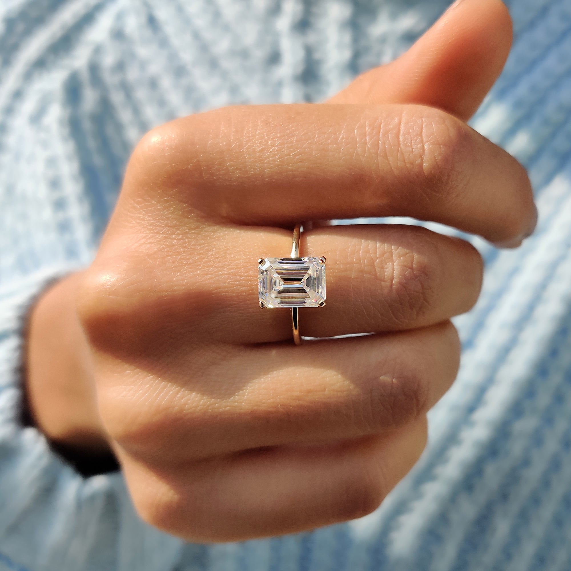 Unique engagement ring with clean knife edge design.
