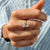 Unique engagement ring with clean knife edge design.
