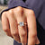Princess cut engagement ring in a 4 prong setting.
