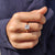 4 prong setting on a rose gold moissanite ring.