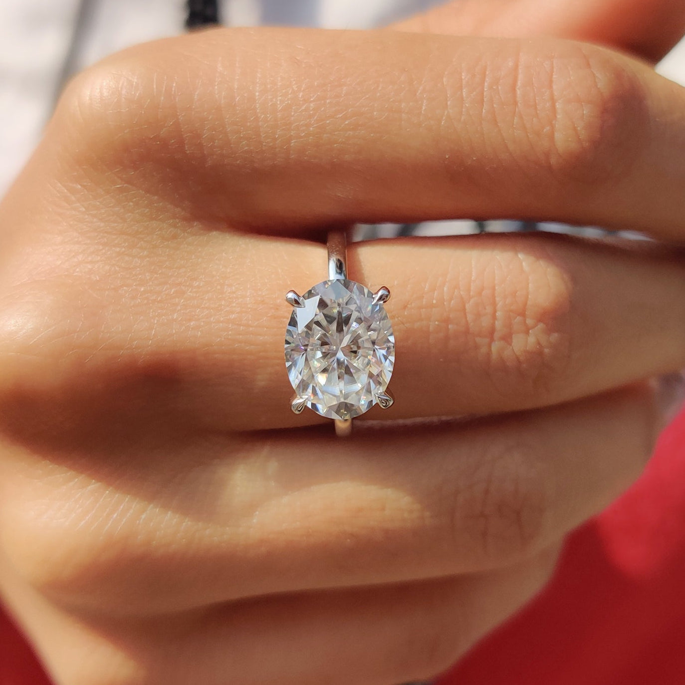 Oval engagement ring with a 4 prong setting.
