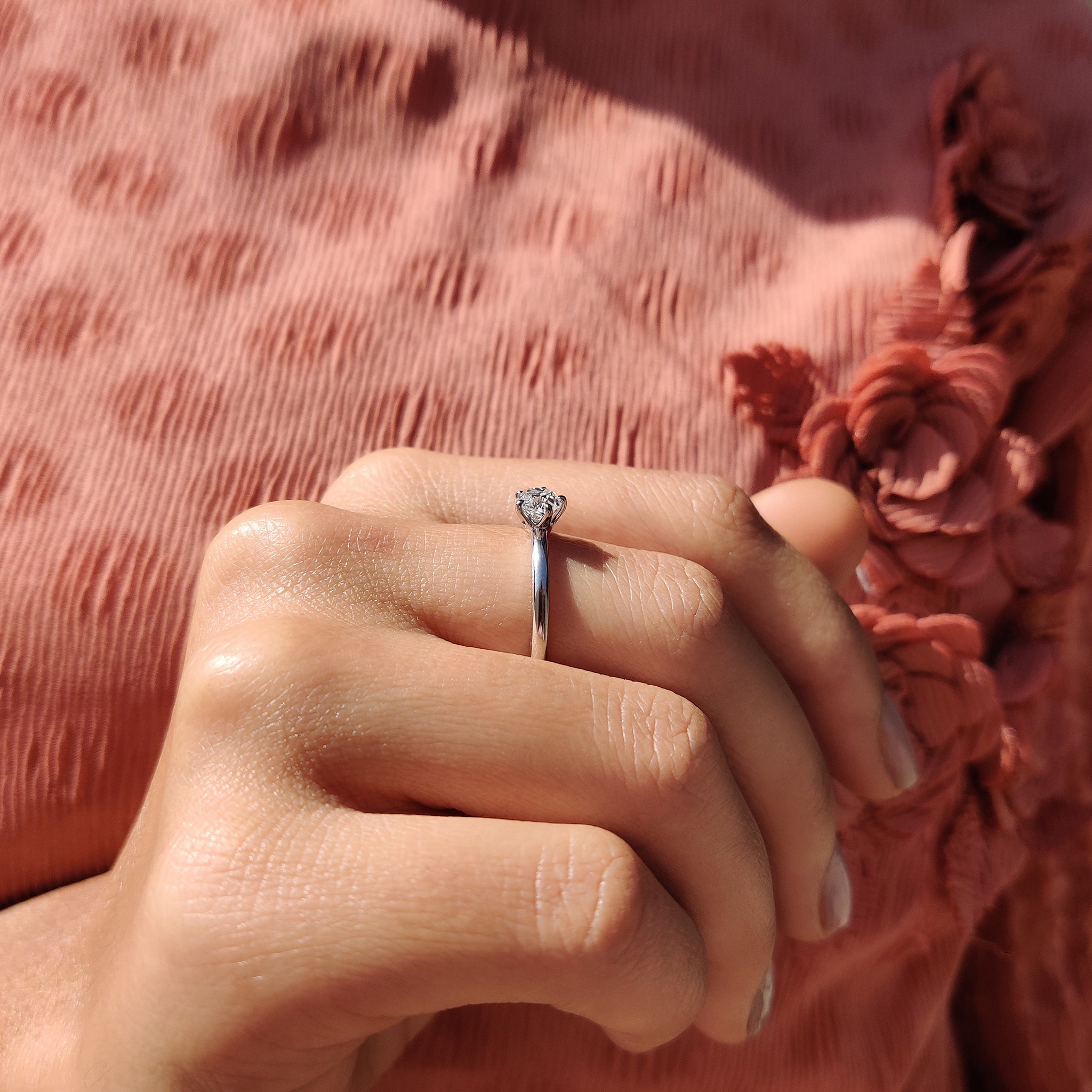 Round old European cut ring in a white gold engagement setting.