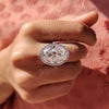 The oval cut ring gives the stone an elegant, elongated shape.