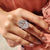 A oval cut moissanite ring offers brilliant sparkle and beauty.
