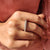 Yellow gold wedding band crafted in warm metal tone.