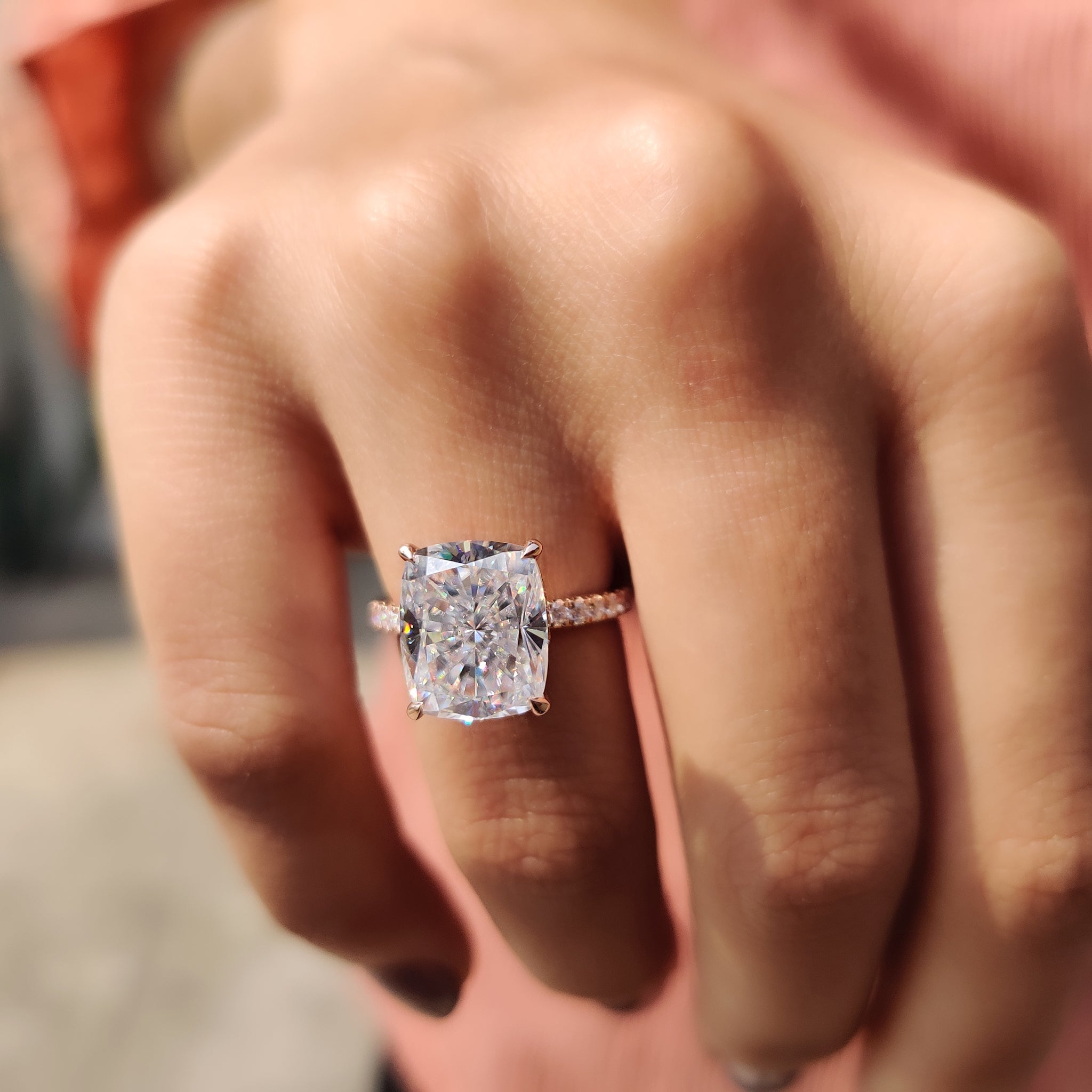 Cushion cut engagement ring with a refined design.
