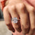 Cushion cut engagement ring with a refined design.
