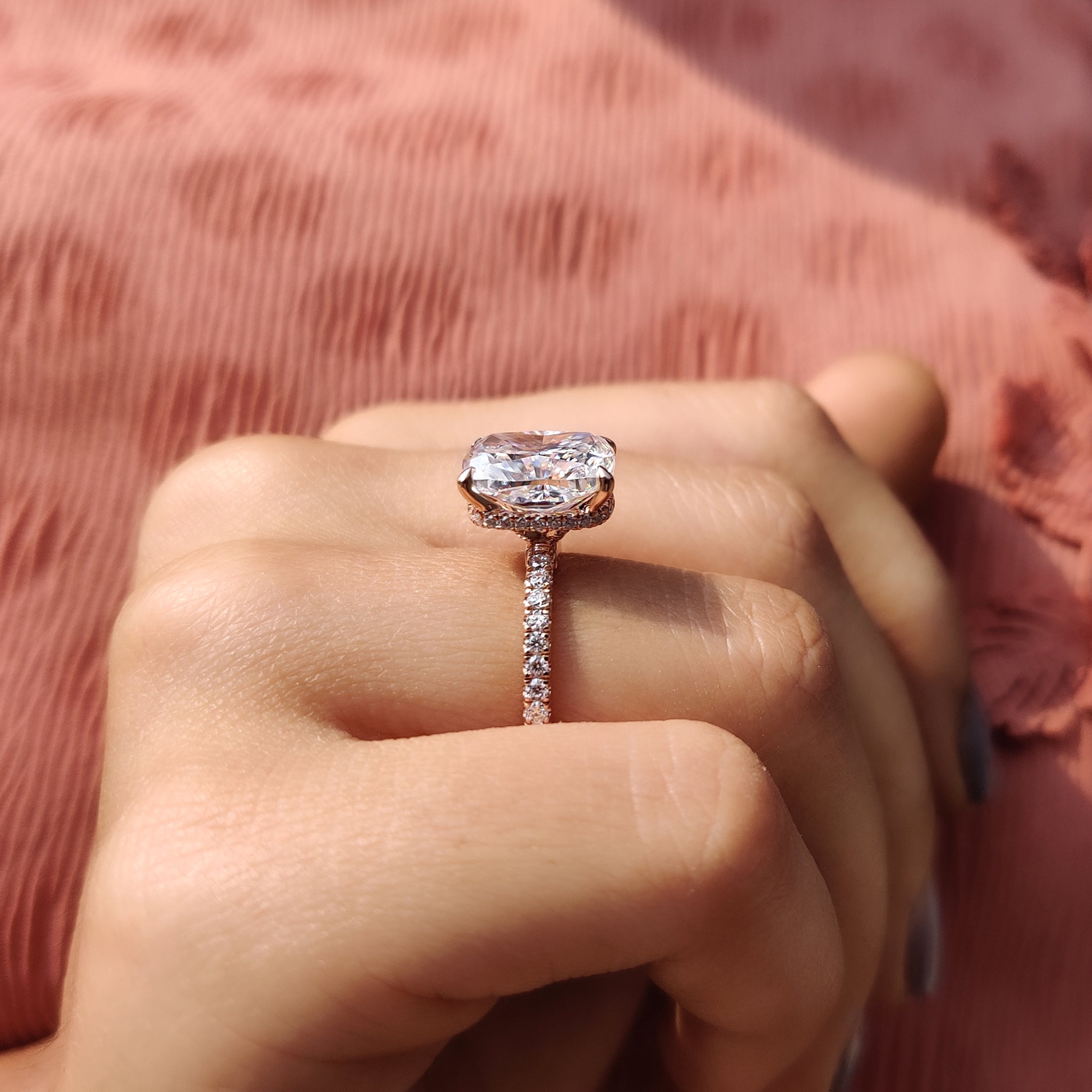 Hidden halo setting engagement ring for extra brilliance.
