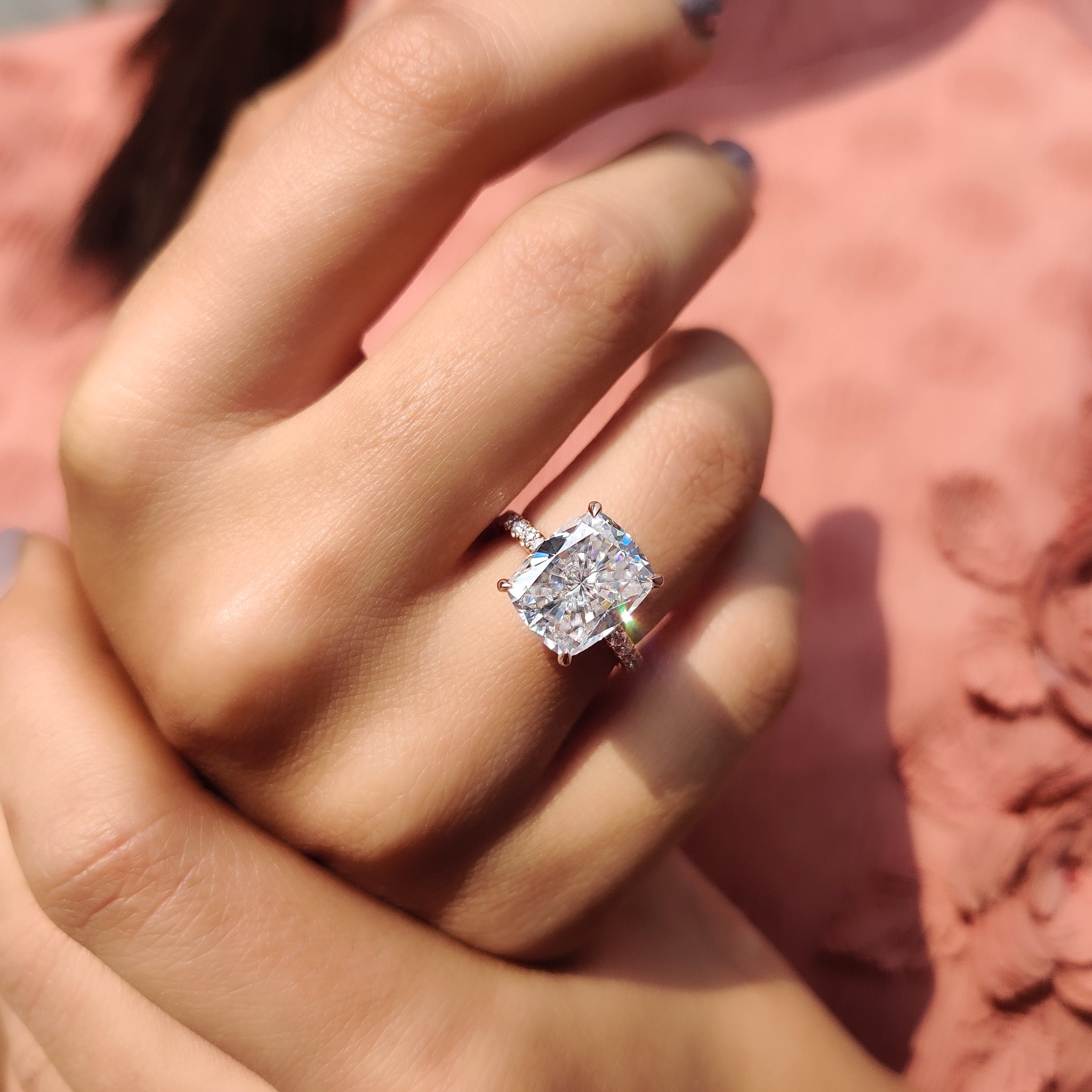 Pave setting engagement ring with intricate detailing.
