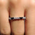 Baguette and round wedding band with mixed shapes.