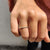 Round cut moissanite band made to shine.