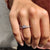 Moissanite marquise gem set in a tiara-style wedding band for elegant and eye-catching detail.