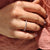 3/4 eternity band with clean side stones.