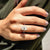 Pave setting with small stones for a shiny, elegant touch.