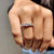 Round rose cut moissanite ring with claw prongs in white gold.