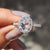 Oval rose cut moissanite engagement ring.

