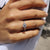 4 prong setting that keeps the stone in place.