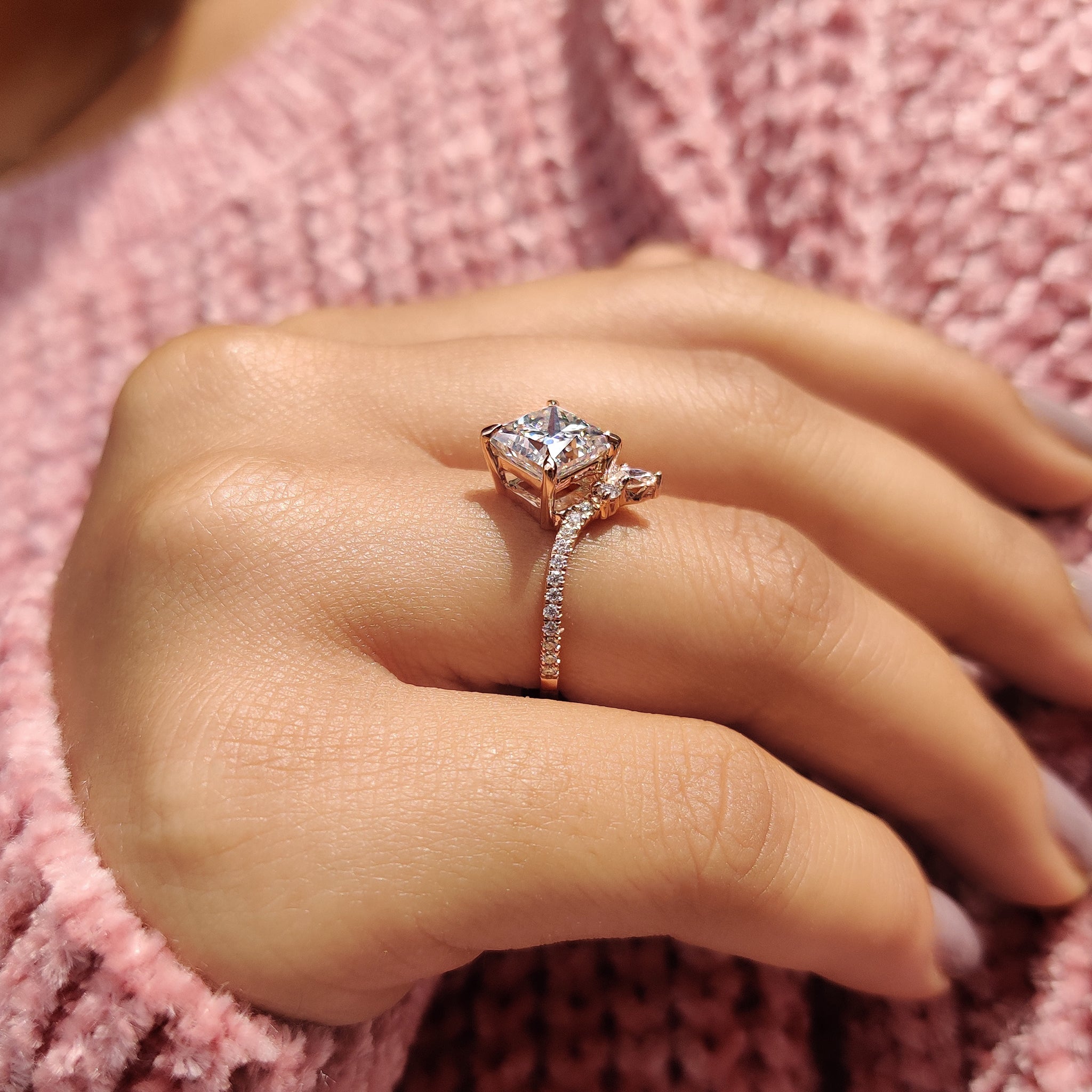 Custom moissanite engagement ring in gold