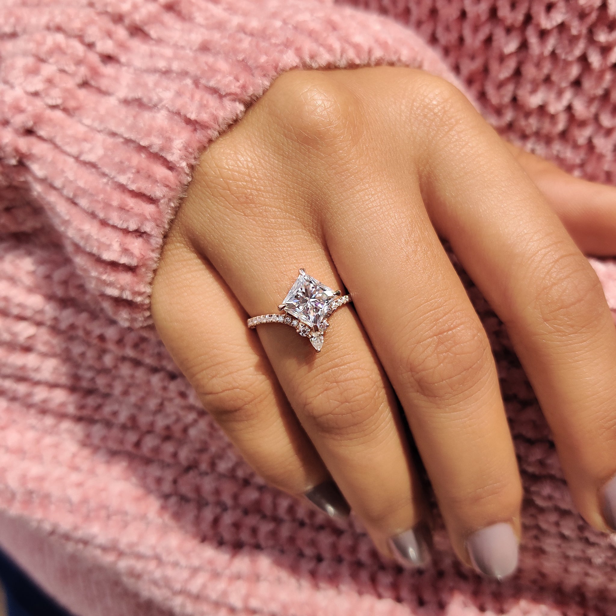 Custom moissanite engagement ring in gold