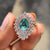 Pear shaped engagement ring with an elegant design