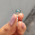 Compass Setting engagement ring with a secure and stylish fit.