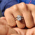 Oval solitaire engagement ring with a sleek, elegant shape.
