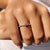Half eternity wedding band designed with evenly spaced moissanite stones.