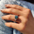 Oval moissanite ring with marquise sidestone ring
