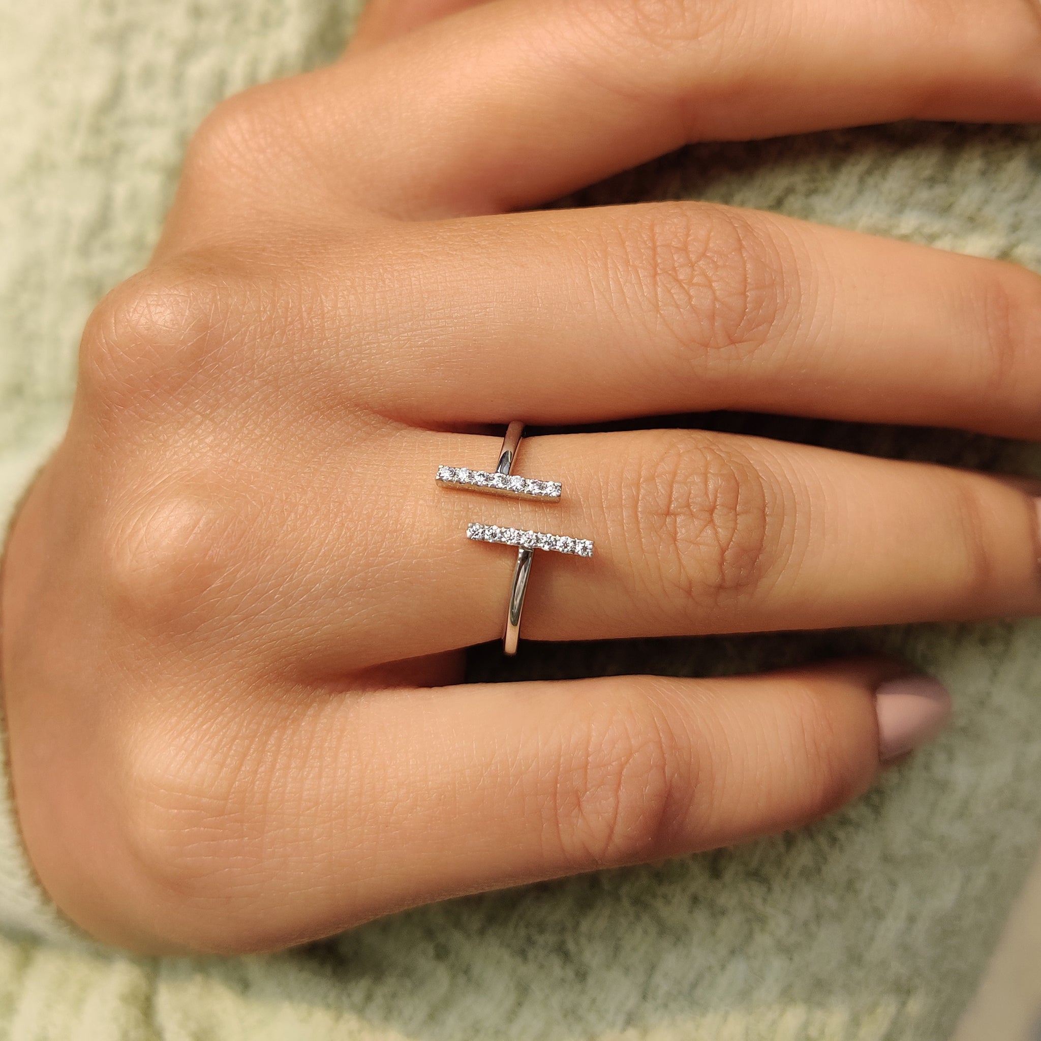 Open gap ring made with moissanite.

