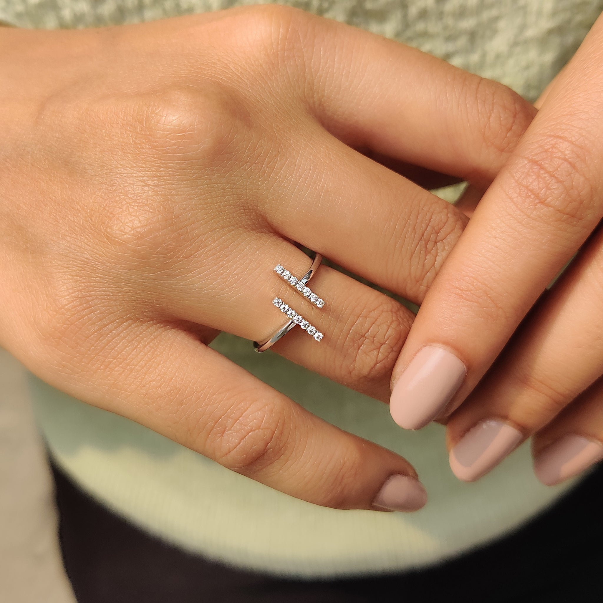 Handmade jewelry featuring an open gap gold design.
