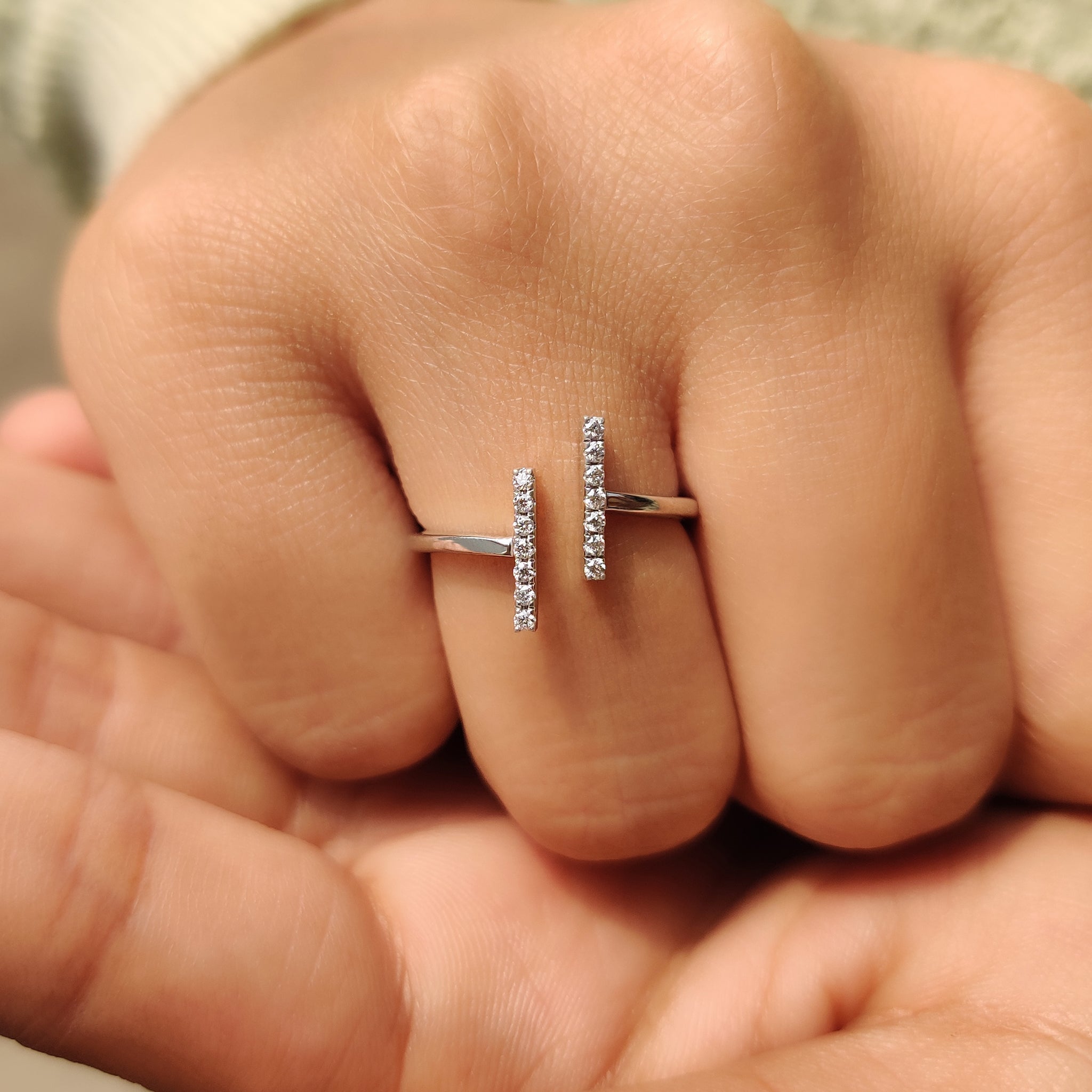 Carat Diamonds engagement ring featuring a round cut moissanite.