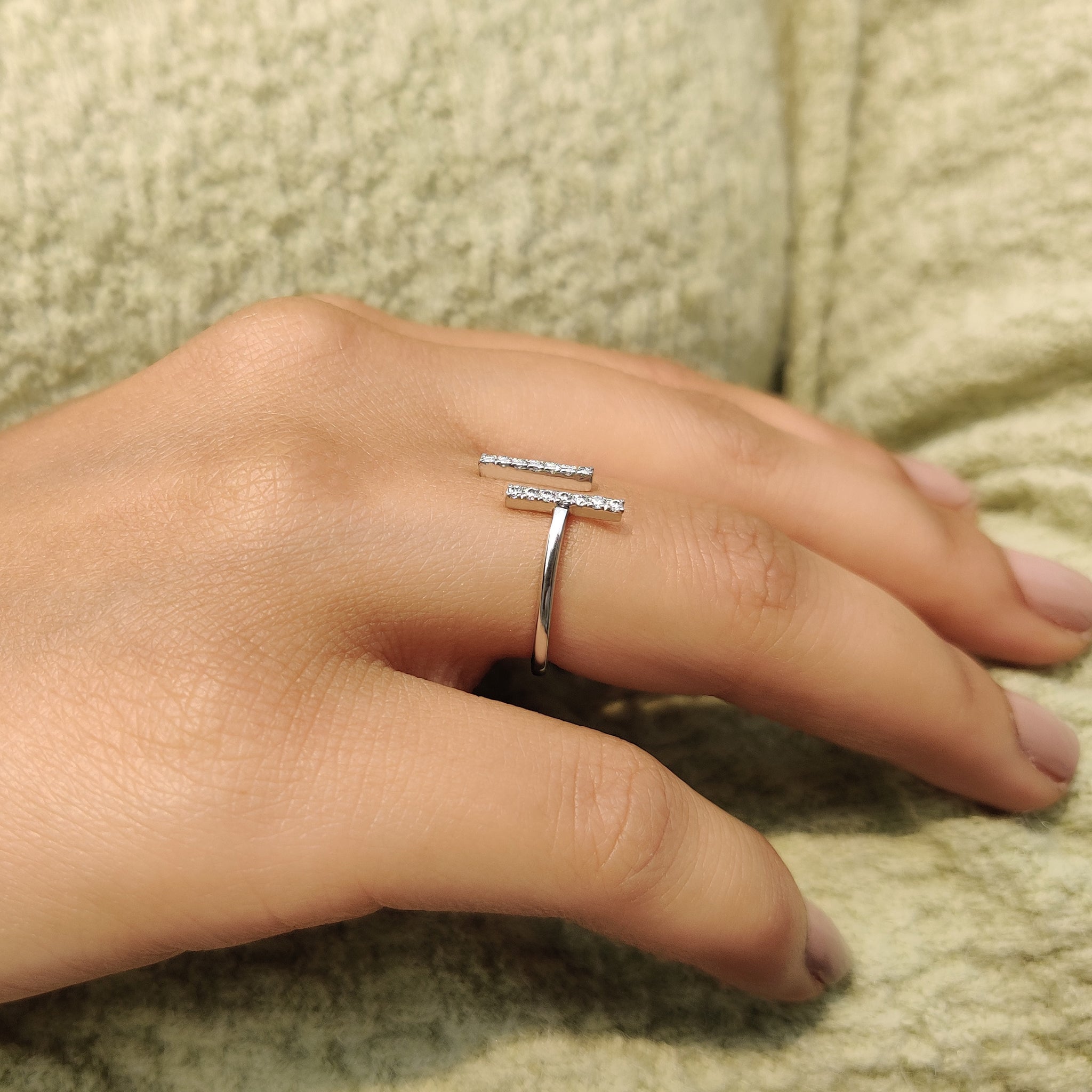 Handmade ring designed with a round cut moissanite.
