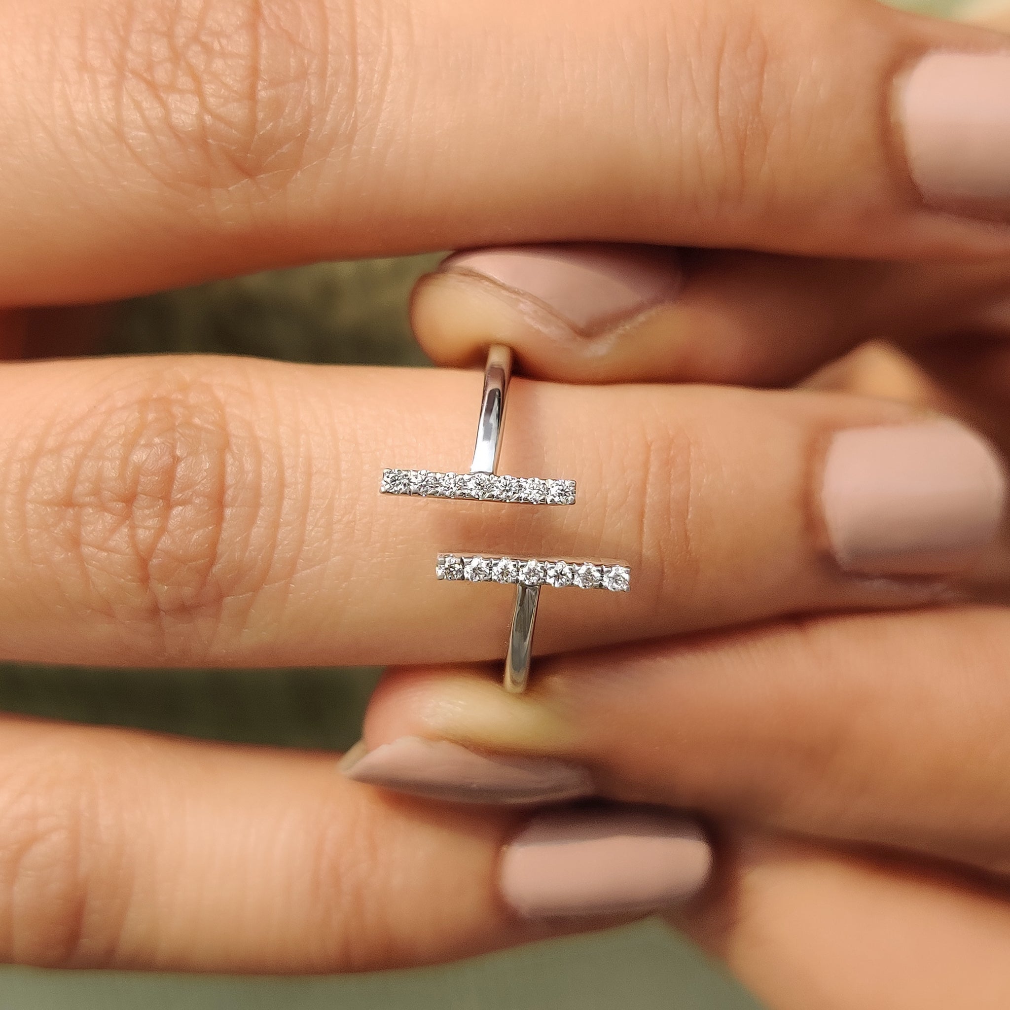 Unique engagement ring crafted with a creative open band.

