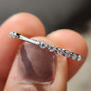 Shared prong setting wedding band for her.
