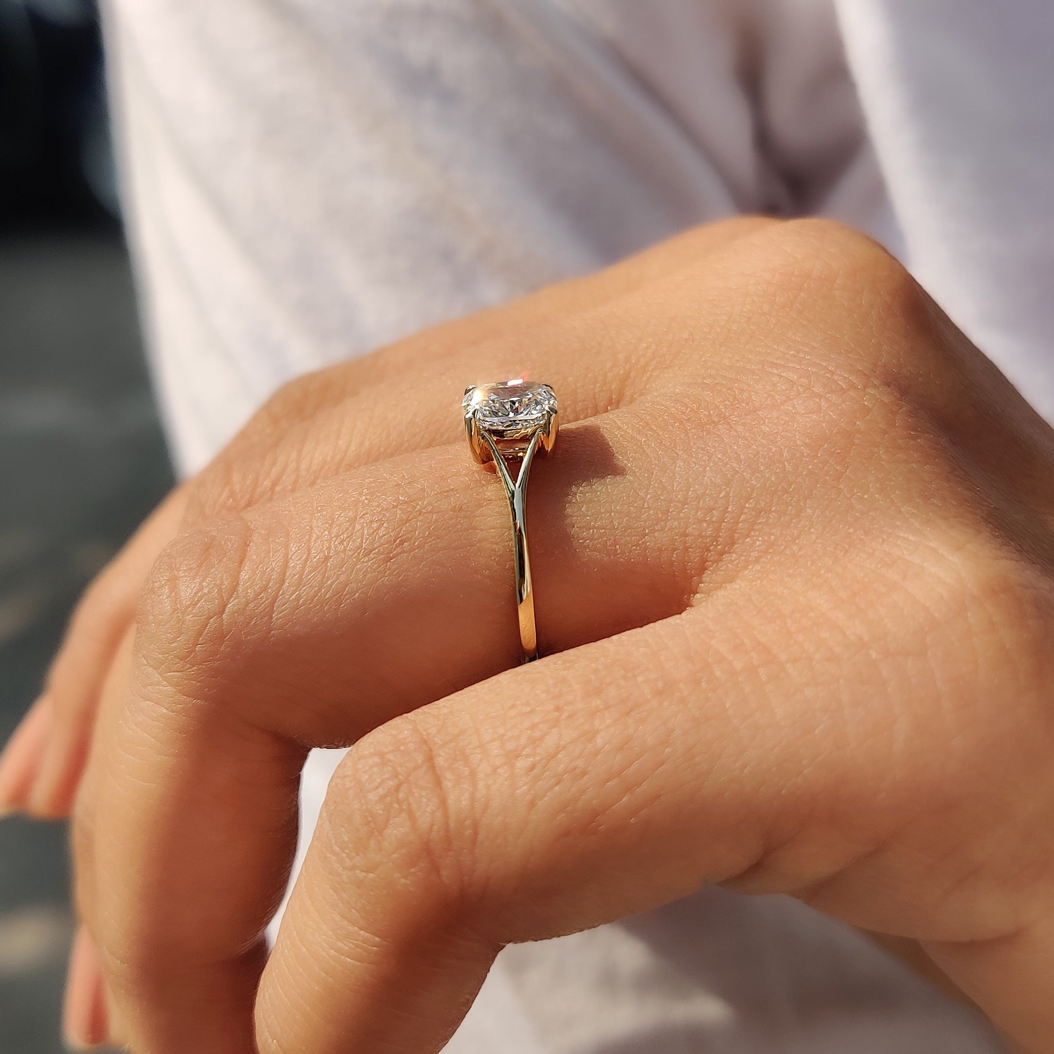 Claw prong setting holding a brilliant diamond securely.
