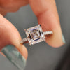 Asscher cut moissanite ring with pave setting band.

