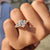Hidden halo engagement ring in yellow gold ring.

