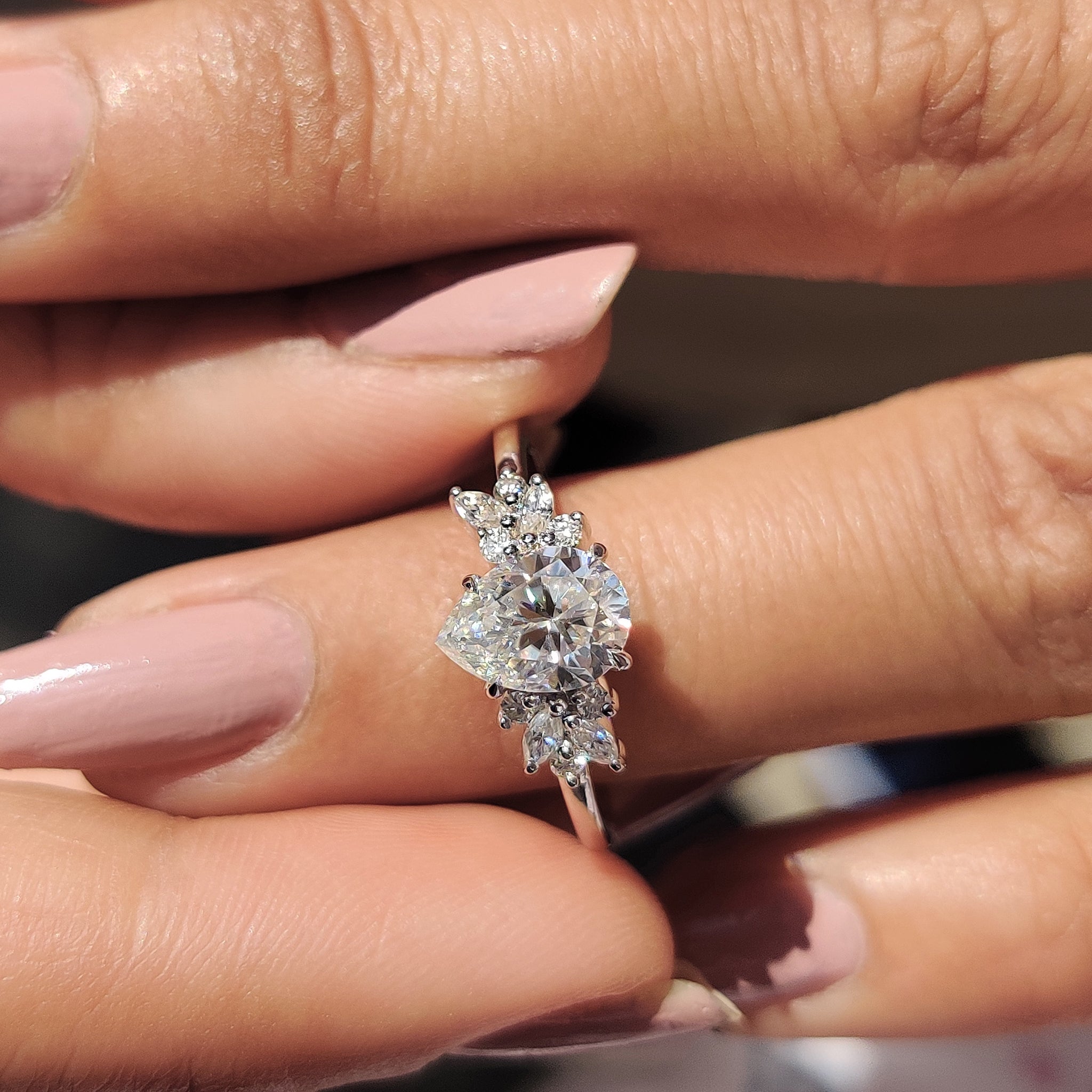 White gold engagement ring with pear cut Moissanite