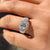 Unique engagement ring features split pave set ring.

