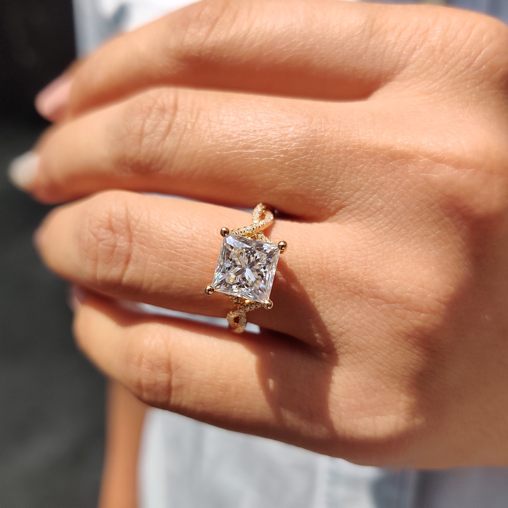 4 round prong setting engagement ring designed to showcase Moissanite brilliance.