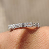 Emerald wedding band with timeless elegance and vibrant style.
