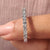 Carat Diamonds band with dazzling diamond accents.
