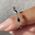 Beautiful band created with shared prong and handmade detail.