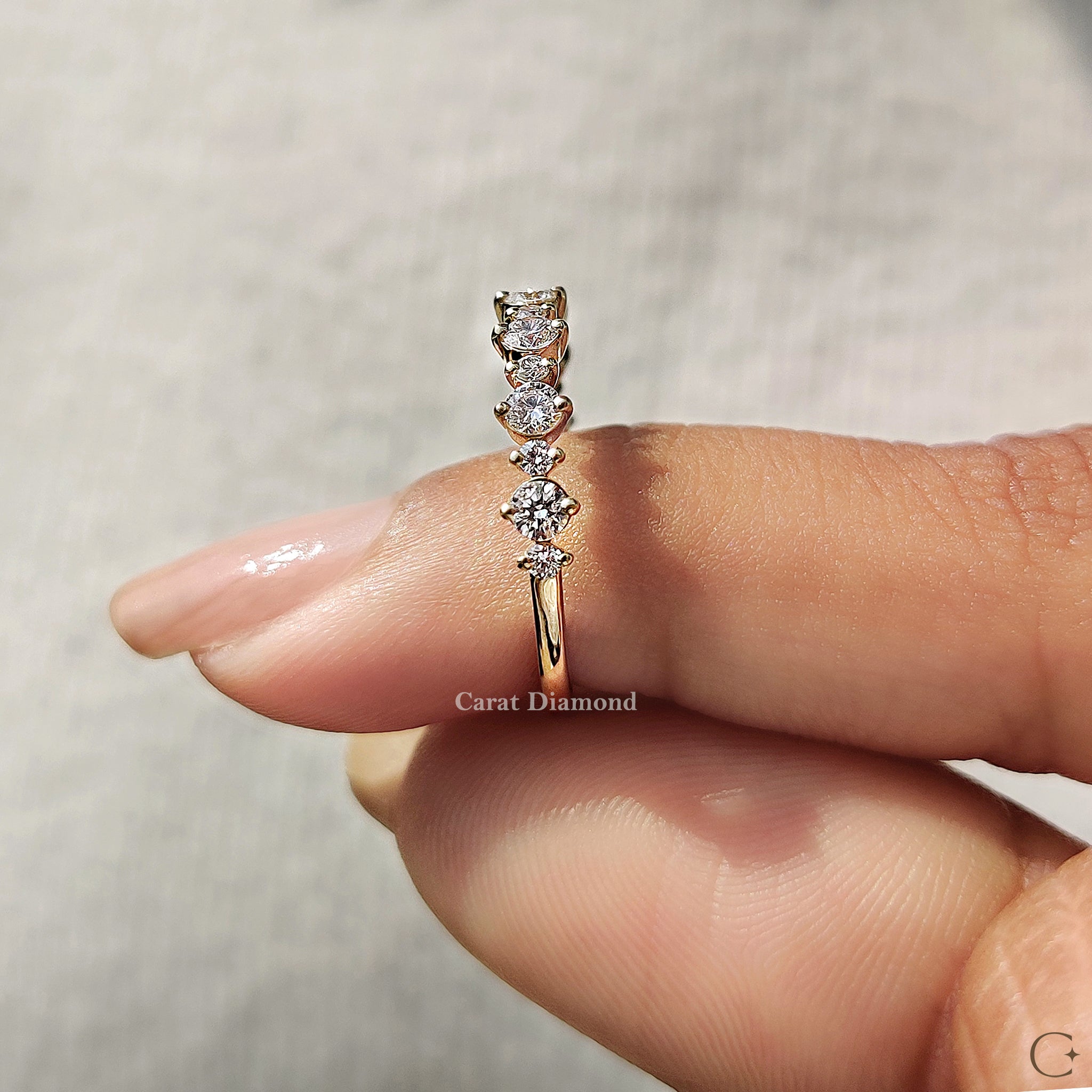 Round diamond wedding band crafted with precision for a classic and elegant look.
