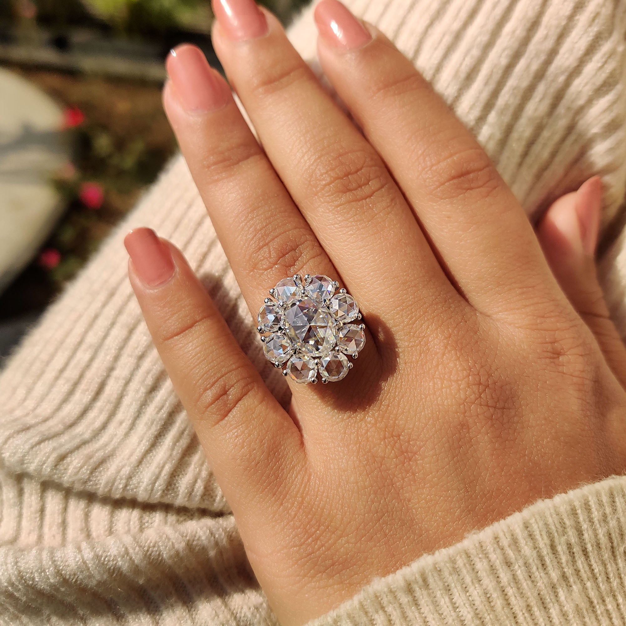 Round Rose cut side stone adds extra shine beside the main diamond.
