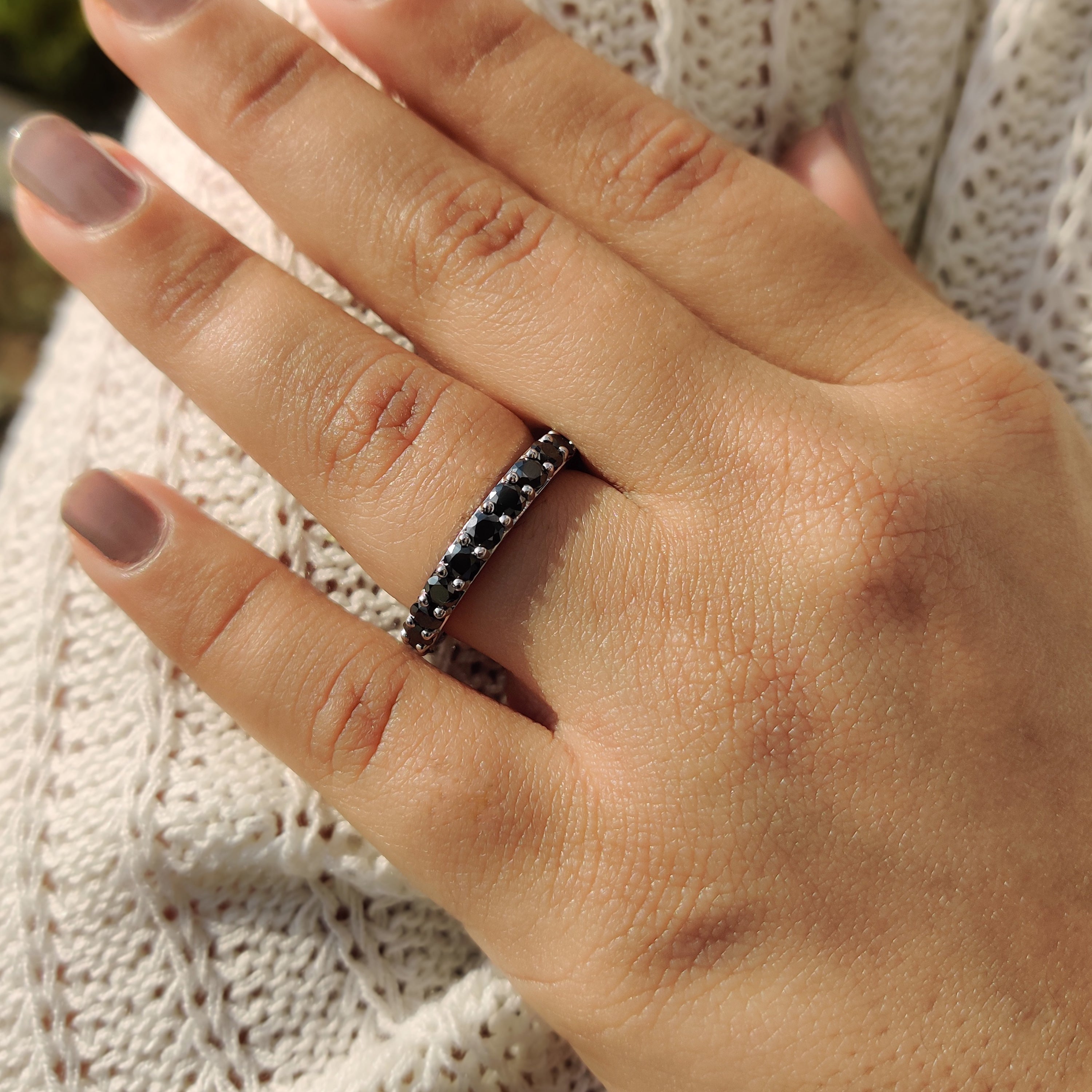 Black Round Cut Wedding Band captures attention with its deep hue.