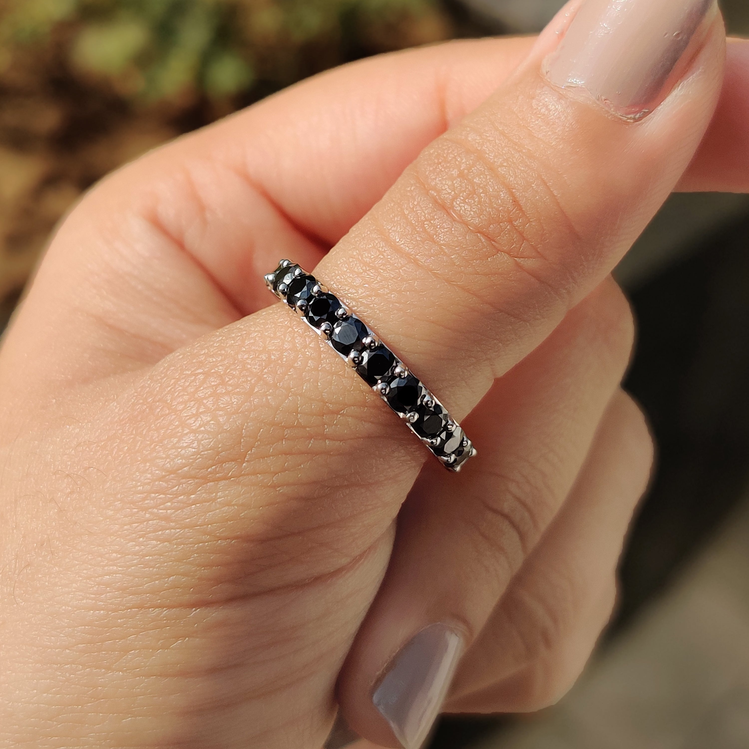 Black Moissanite Wedding Band shines with a bold design.